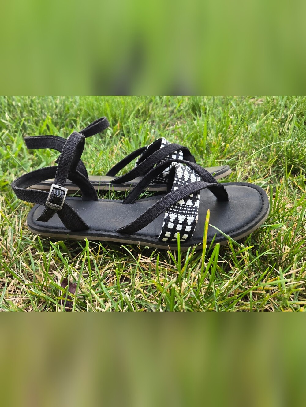 TOMS Black Sandals with White Woven Accents